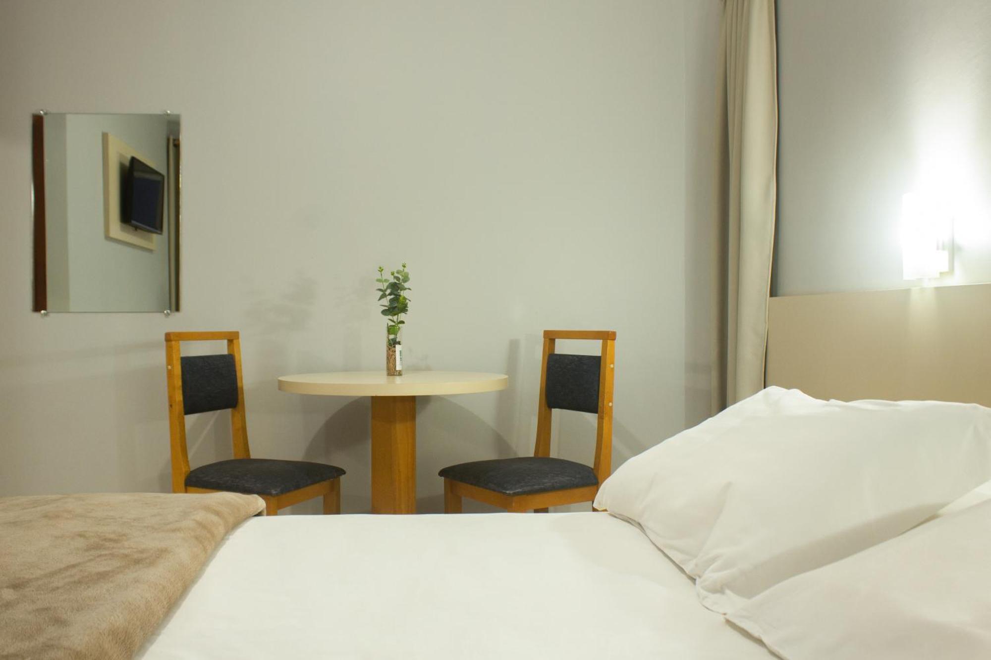 Hotel Cavera Alegrete Bagian luar foto